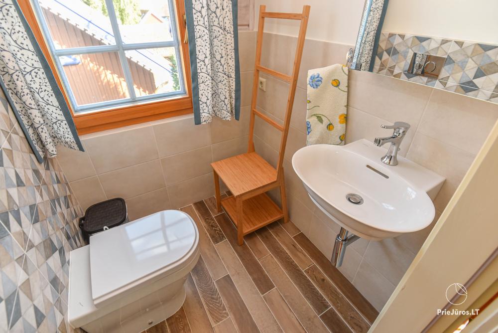 Villa Erika in Nida Zentrum - Blockhaus mit einem Hof und Terrasse