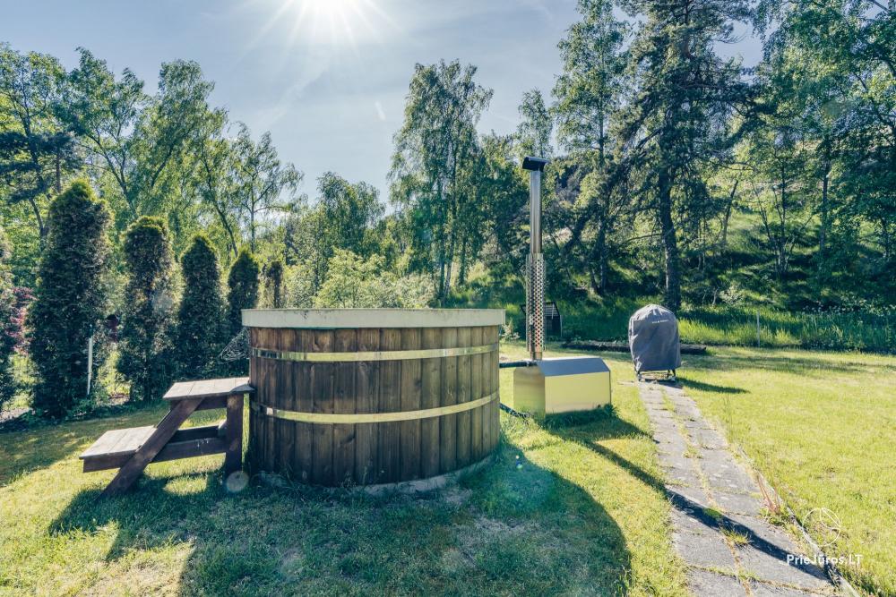 Zwei Apartments mit Garten und Whirlpool in Preila