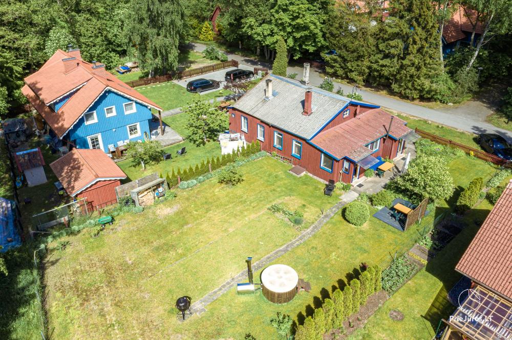 Zwei Apartments mit Garten und Whirlpool in Preila