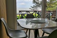 Ferienhaus mit Terrasse in Nida und anderen Wohnungen