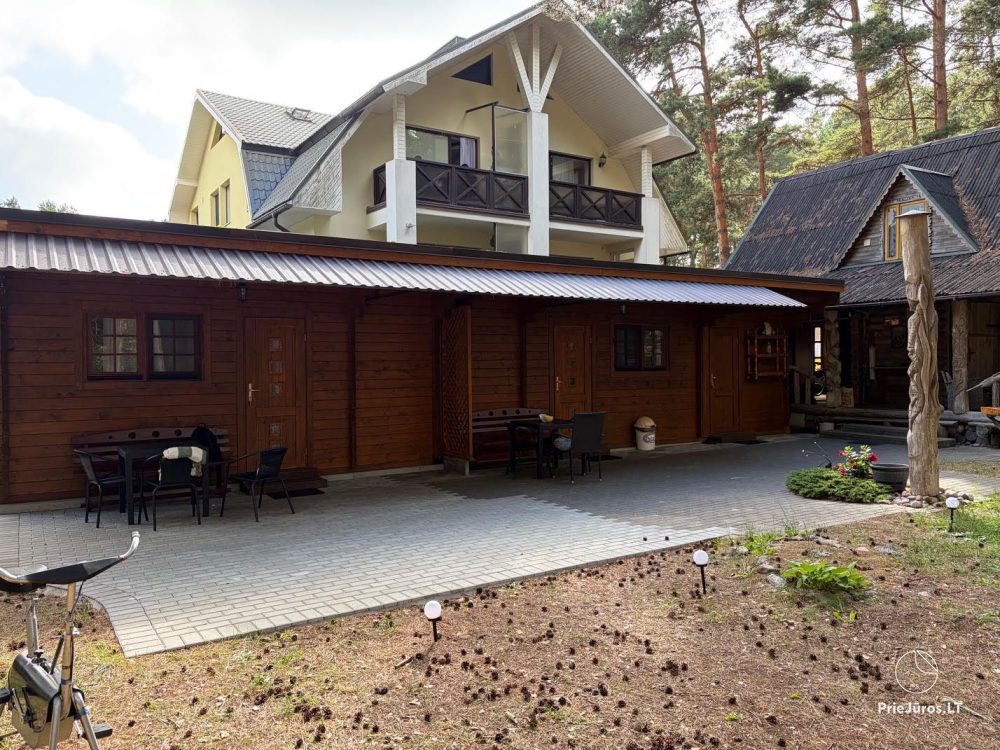 Hütten im Kiefernwald von Palanga, am Meer und Apartments in „Malūno vilos“