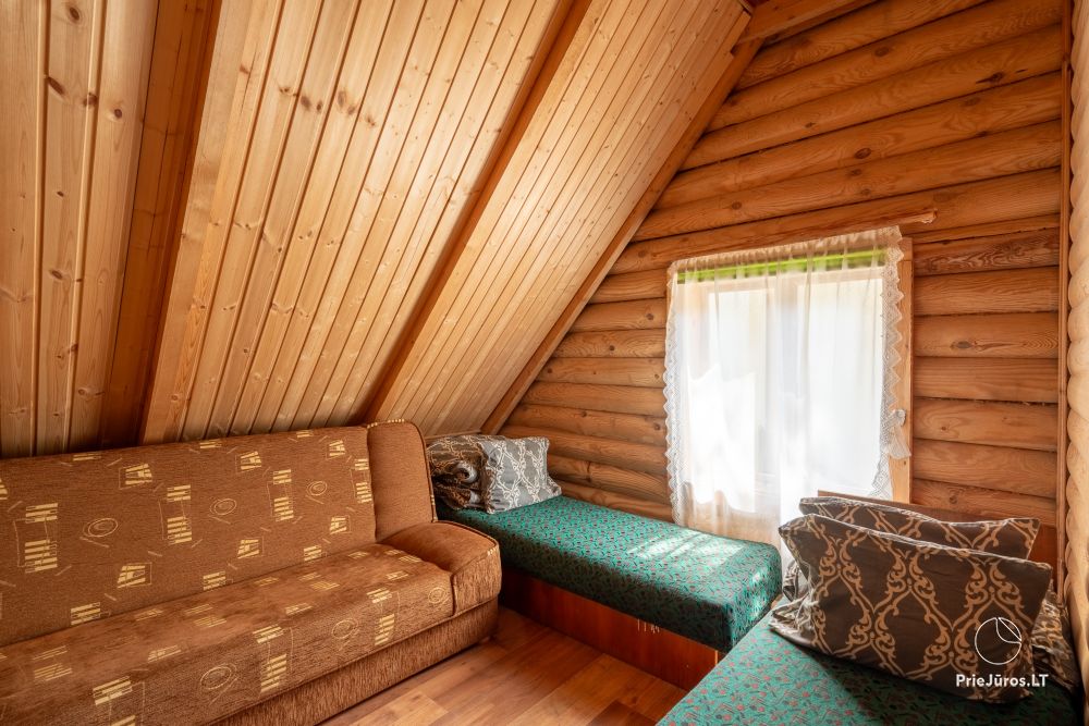 Hütten im Kiefernwald von Palanga, am Meer und Apartments in „Malūno vilos“