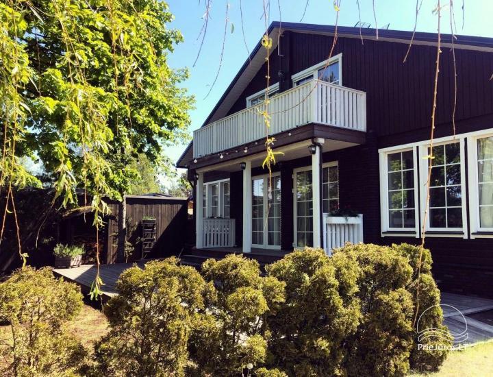 Riverfront Home - Skandinavische Ferienhäuser am Flussufer