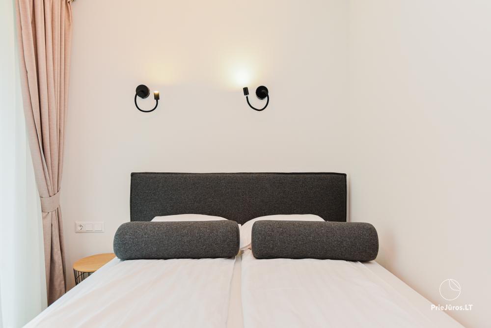 Neue Wohnung in der Nähe der Kurischen Lagune im 1. Stock mit großer Terrasse