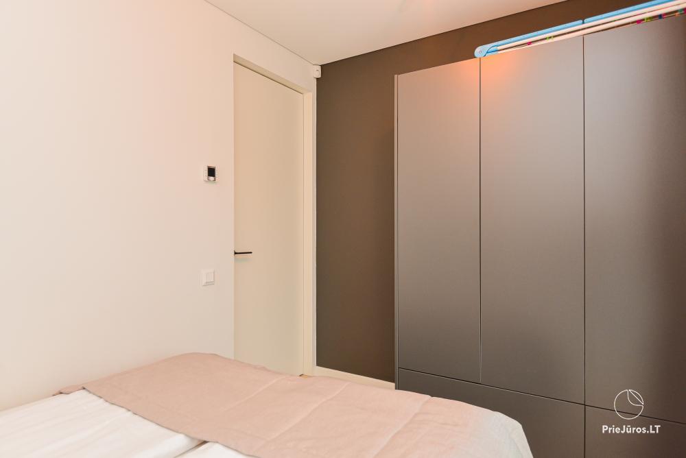 Neue Wohnung in der Nähe der Kurischen Lagune im 1. Stock mit großer Terrasse
