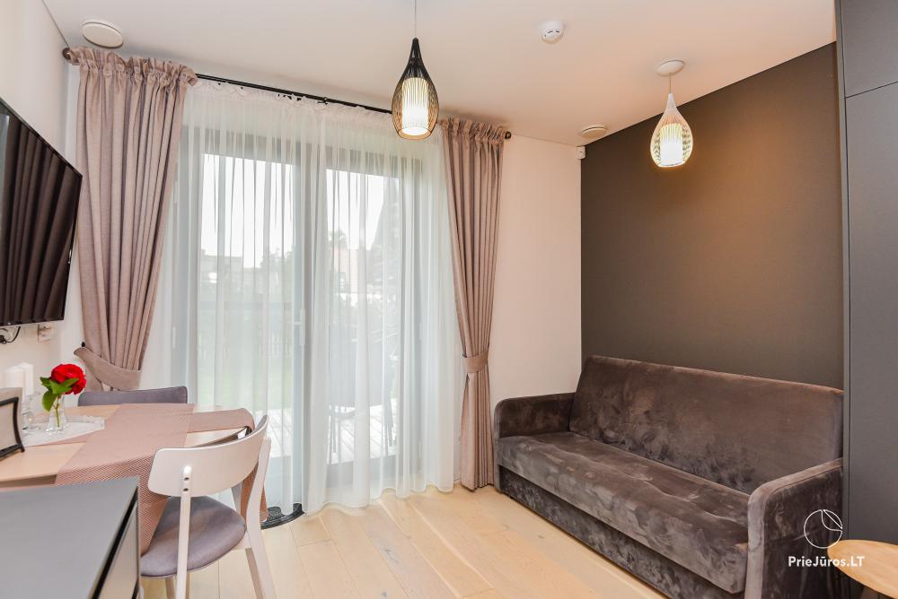 Neue Wohnung in der Nähe der Kurischen Lagune im 1. Stock mit großer Terrasse