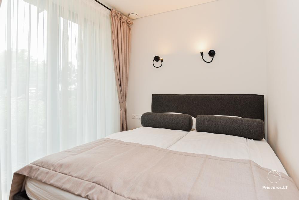 Neue Wohnung in der Nähe der Kurischen Lagune im 1. Stock mit großer Terrasse