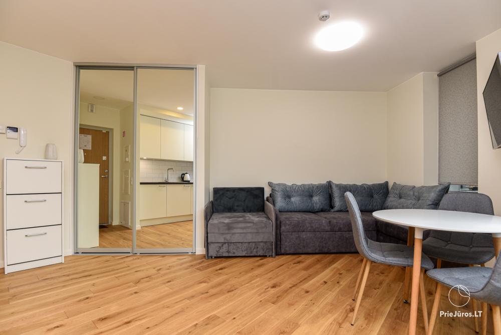 Neue Einzimmerwohnung mit Terrasse zu vermieten in Sventoji
