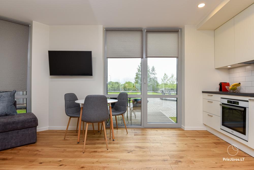 Neue Einzimmerwohnung mit Terrasse zu vermieten in Sventoji