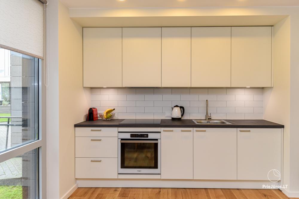 Neue Einzimmerwohnung mit Terrasse zu vermieten in Sventoji