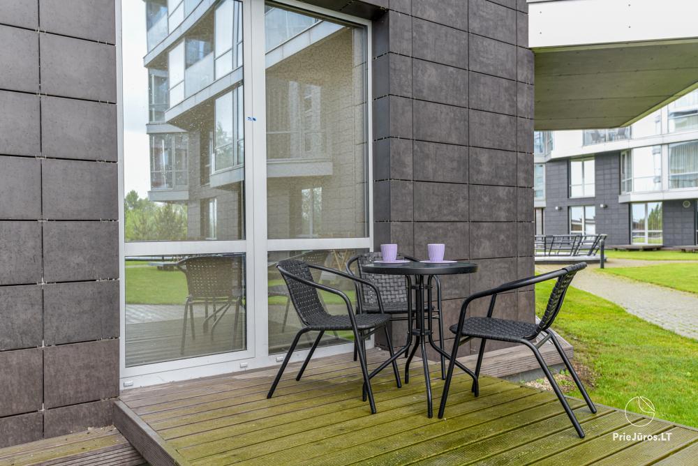 Neue Einzimmerwohnung mit Terrasse zu vermieten in Sventoji