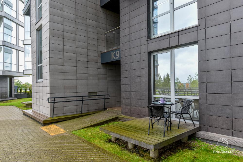 Neue Einzimmerwohnung mit Terrasse zu vermieten in Sventoji