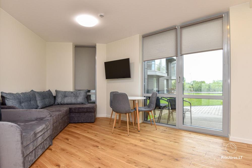 Neue Einzimmerwohnung mit Terrasse zu vermieten in Sventoji
