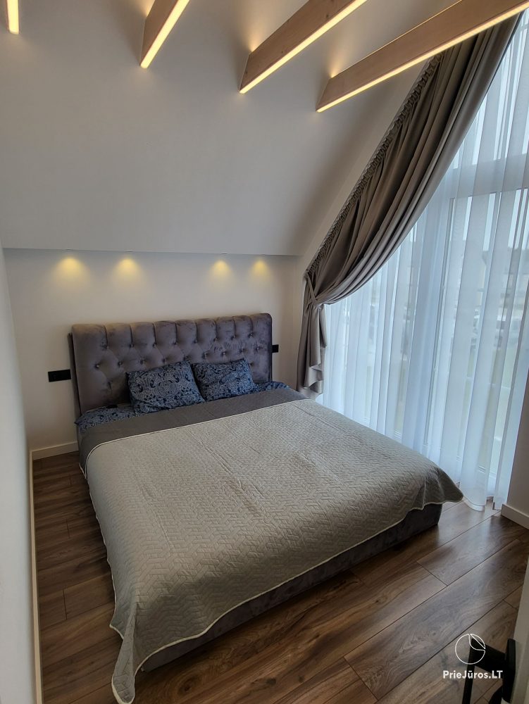 Neues Ferienhaus mit geräumiger Terrasse für bis zu 6 Personen in Kunigiskiai