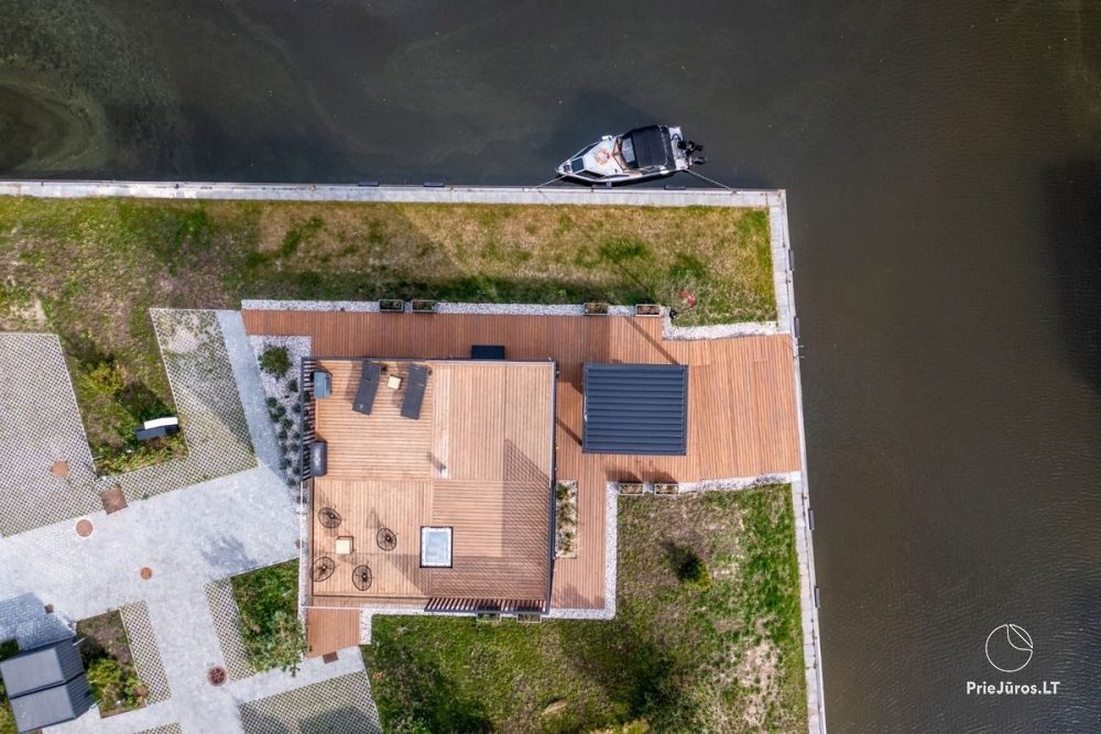Hausvermietung ‚Flaghouse‘ in Svencelė – ein einzigartiger Ort für Erholung für sechs Personen, 3 Schlafzimmer, 2 Terrassen, Grill