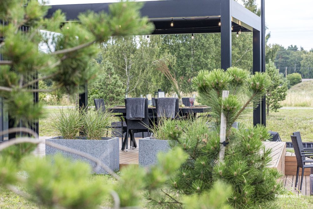 Hausvermietung ‚Flaghouse‘ in Svencelė – ein einzigartiger Ort für Erholung für sechs Personen, 3 Schlafzimmer, 2 Terrassen, Grill
