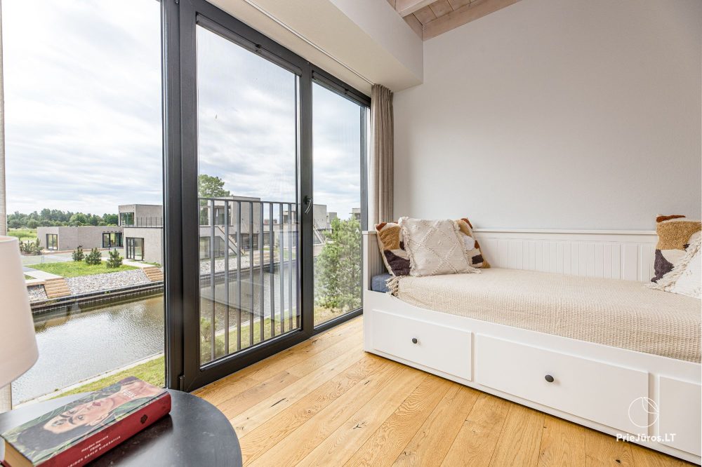 Hausvermietung ‚Flaghouse‘ in Svencelė – ein einzigartiger Ort für Erholung für sechs Personen, 3 Schlafzimmer, 2 Terrassen, Grill