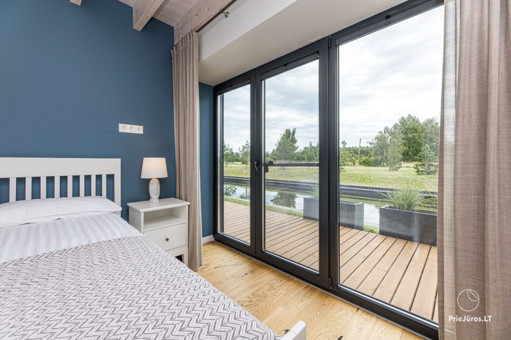 Hausvermietung ‚Flaghouse‘ in Svencelė – ein einzigartiger Ort für Erholung für sechs Personen, 3 Schlafzimmer, 2 Terrassen, Grill