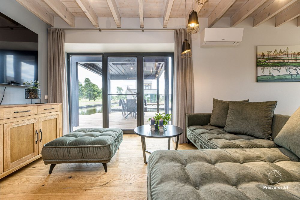 Hausvermietung ‚Flaghouse‘ in Svencelė – ein einzigartiger Ort für Erholung für sechs Personen, 3 Schlafzimmer, 2 Terrassen, Grill