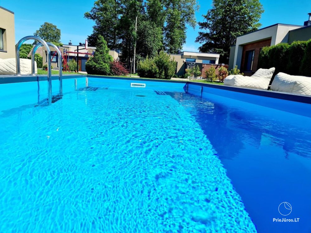 Sea Garden – Ferienhaus mit Pool in Kunigiškiai