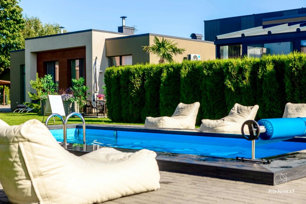 Sea Garden – Ferienhaus mit Pool in Kunigiškiai