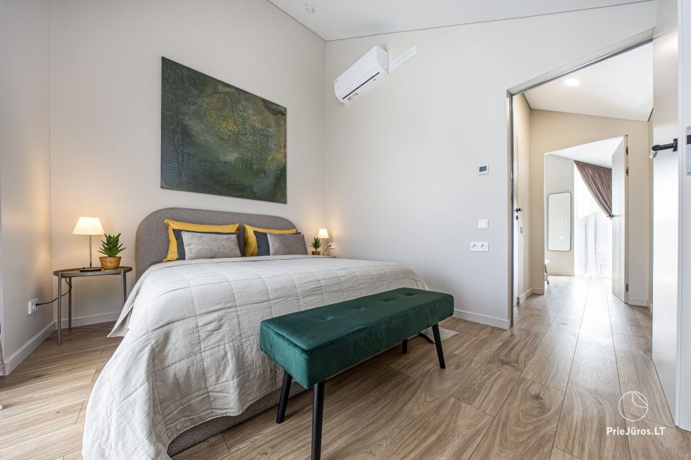 Lyrika home - in Monciškės - geräumiges Stadthaus mit 2 Schlafzimmern und Terrasse für vier Personen, im neuen Viertel J7 Beržas mit Pools, Saunen und Grill