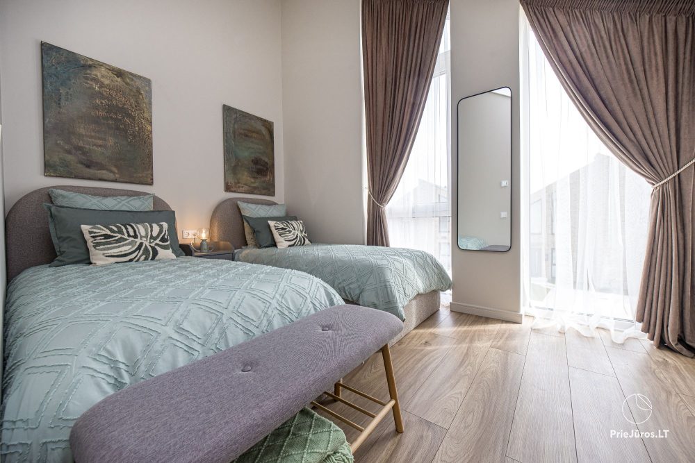 Lyrika home - in Monciškės - geräumiges Stadthaus mit 2 Schlafzimmern und Terrasse für vier Personen, im neuen Viertel J7 Beržas mit Pools, Saunen und Grill