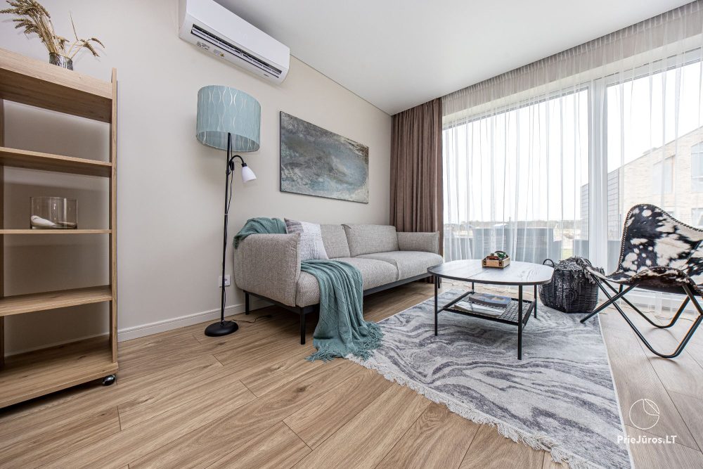 Lyrika home - in Monciškės - geräumiges Stadthaus mit 2 Schlafzimmern und Terrasse für vier Personen, im neuen Viertel J7 Beržas mit Pools, Saunen und Grill
