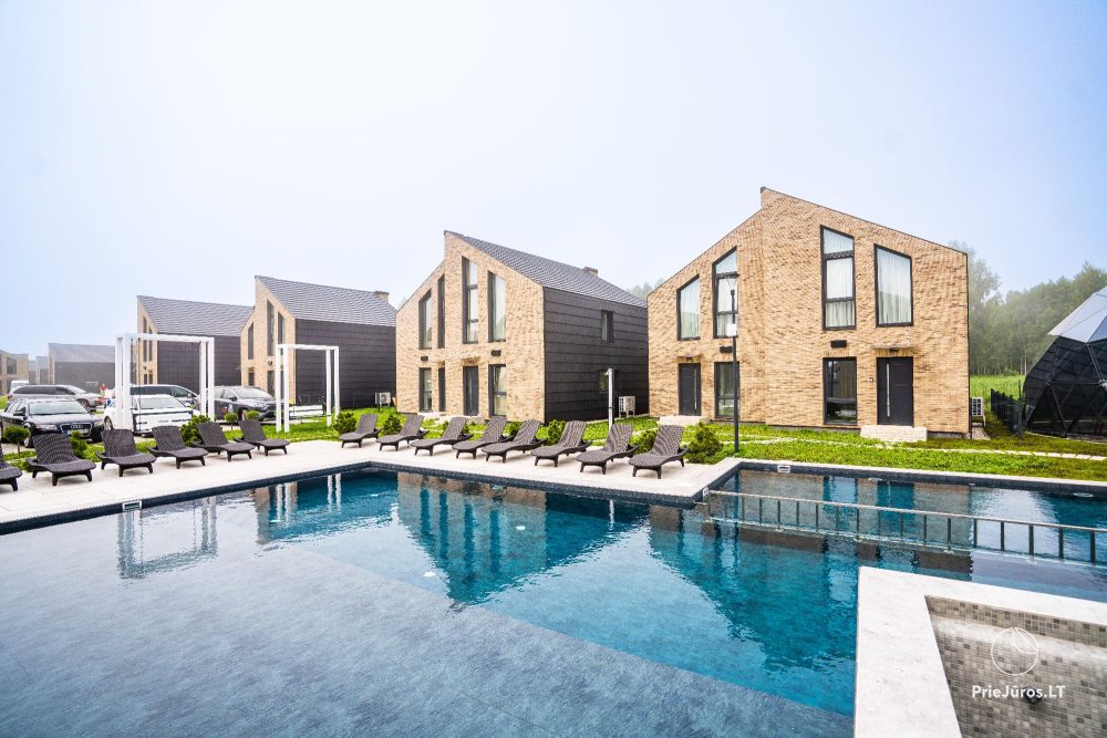 Lyrika home - in Monciškės - geräumiges Stadthaus mit 2 Schlafzimmern und Terrasse für vier Personen, im neuen Viertel J7 Beržas mit Pools, Saunen und Grill