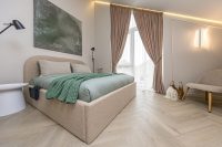 Novelė home - Geräumiges Zweizimmer-Cottage mit Terrasse für vier Personen in Monciškėse, im neuen Viertel J7 Beržas mit Pools und Saunen, Grill