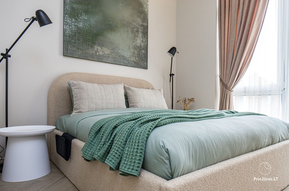 Novelė home - Geräumiges Zweizimmer-Cottage mit Terrasse für vier Personen in Monciškėse, im neuen Viertel J7 Beržas mit Pools und Saunen, Grill