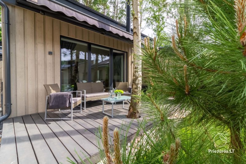 Family Beach House mit beheiztem Pool in Kunigiskiai