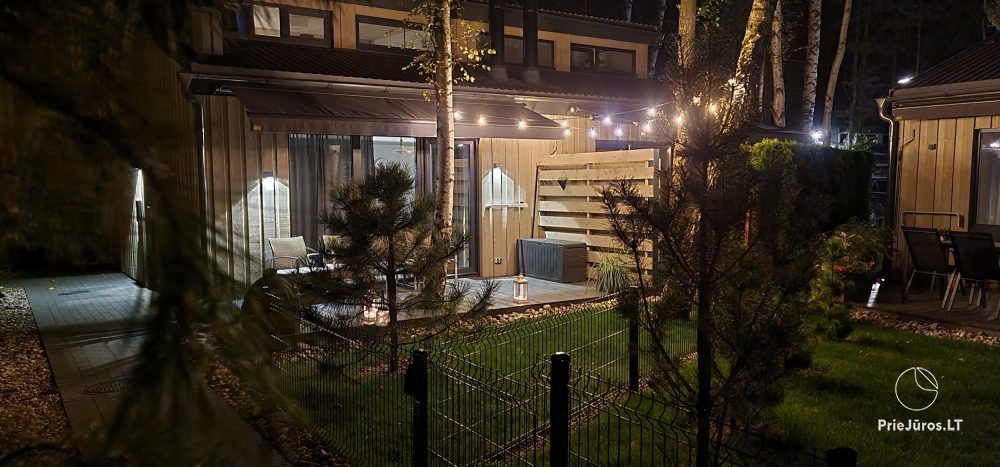 Family Beach House mit beheiztem Pool in Kunigiskiai