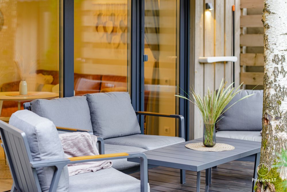 Family Beach House mit beheiztem Pool in Kunigiskiai