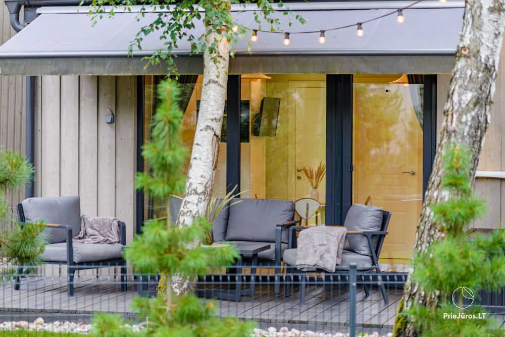Family Beach House mit beheiztem Pool in Kunigiskiai