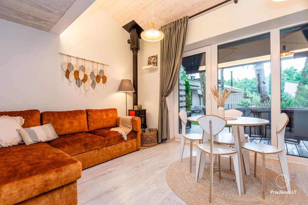 Family Beach House mit beheiztem Pool in Kunigiskiai