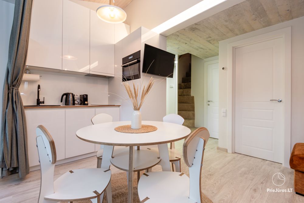 Family Beach House mit beheiztem Pool in Kunigiskiai