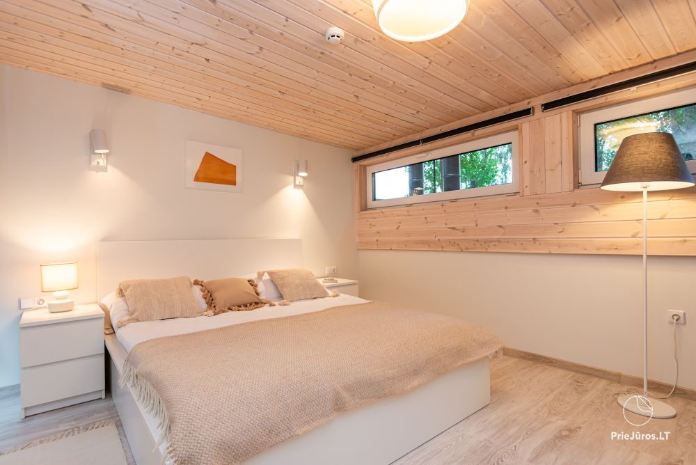 Family Beach House mit beheiztem Pool in Kunigiskiai