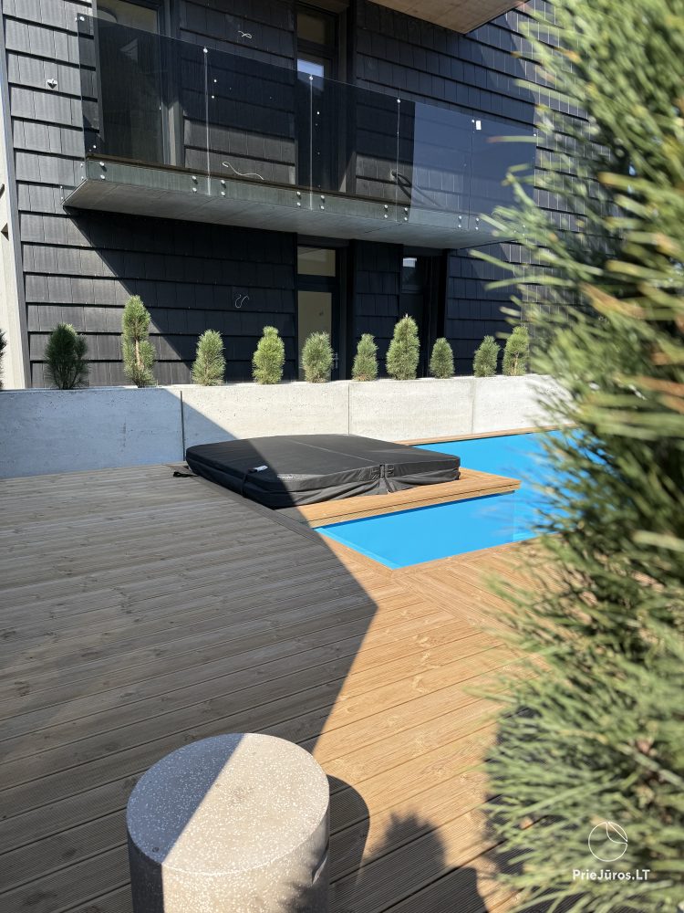 „Alaïa“ Apartments in Kunigiškiai mit beheiztem Pool und Whirlpool