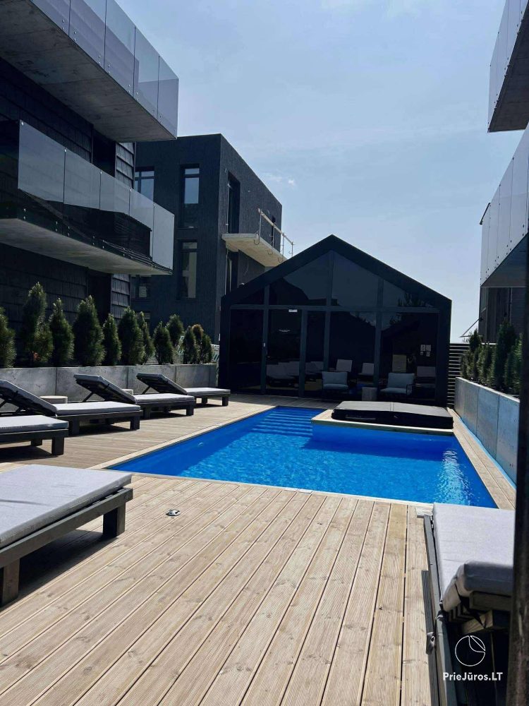 „Alaïa“ Apartments in Kunigiškiai mit beheiztem Pool und Whirlpool