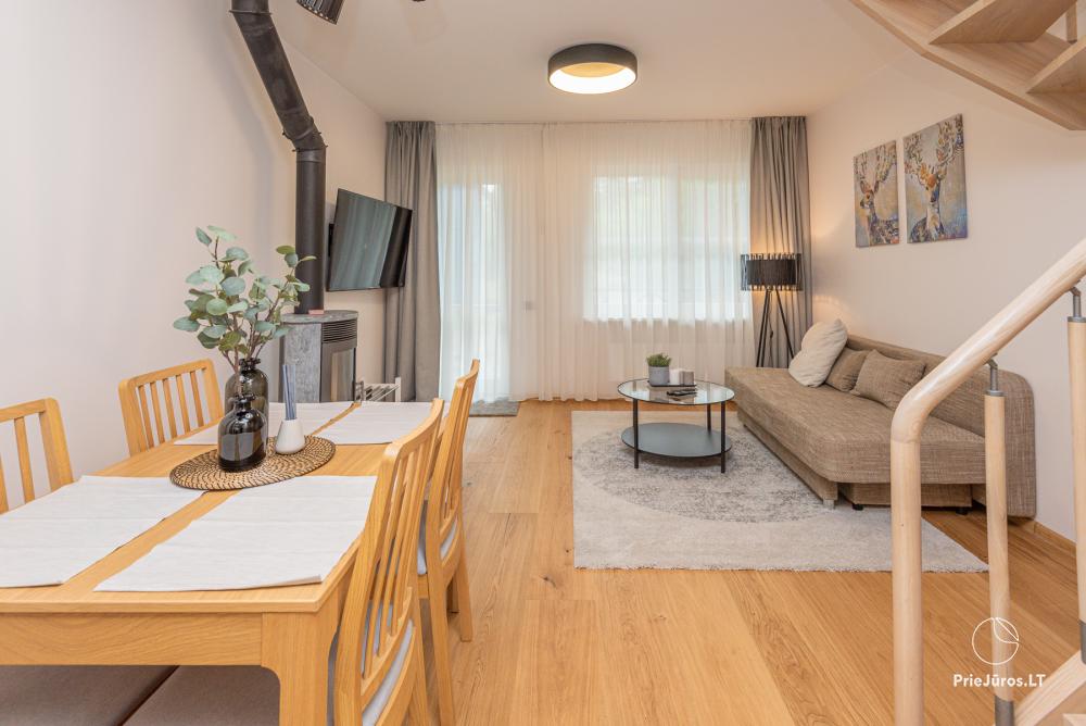 3-Zimmer-Ferienhaus in Pervalka mit Kamin und Sauna