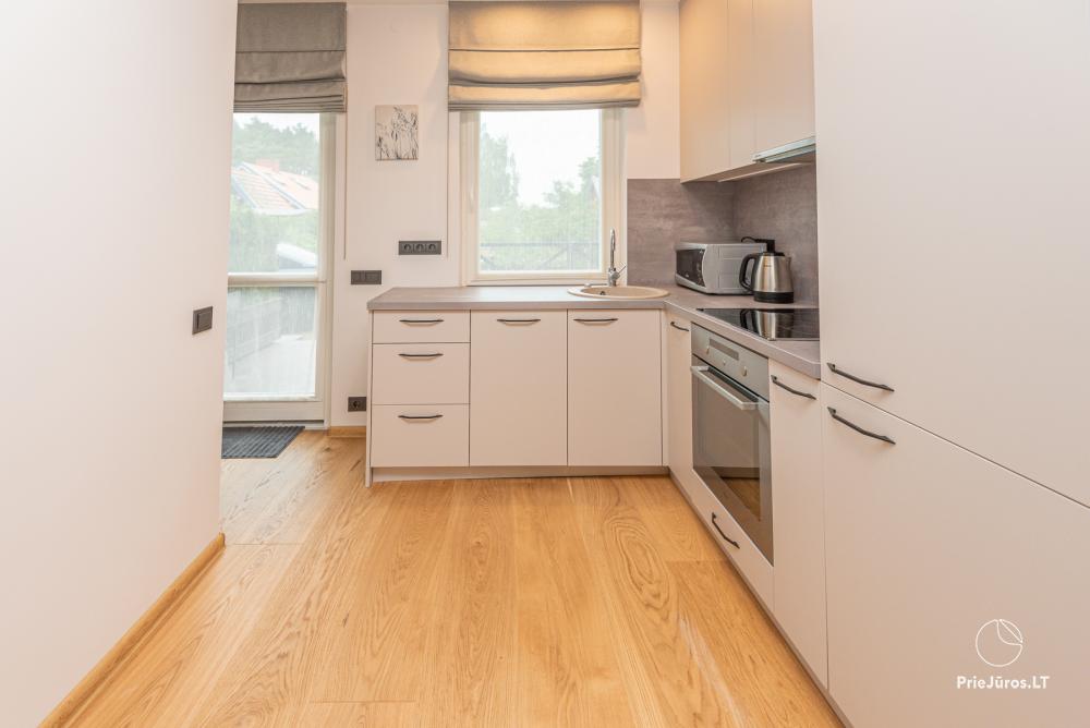 3-Zimmer-Ferienhaus in Pervalka mit Kamin und Sauna