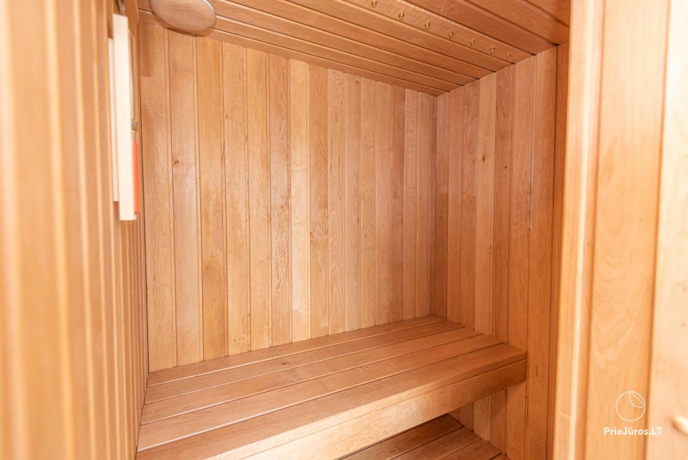 3-Zimmer-Ferienhaus in Pervalka mit Kamin und Sauna