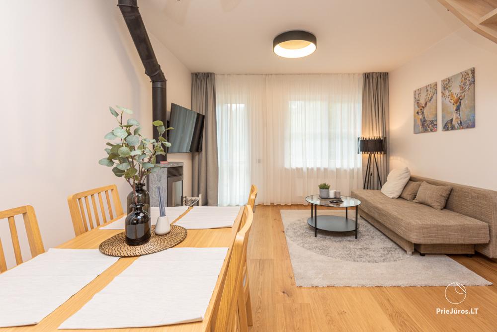 3-Zimmer-Ferienhaus in Pervalka mit Kamin und Sauna