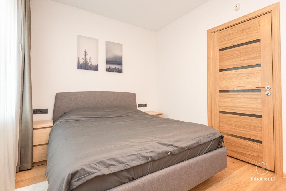 3-Zimmer-Ferienhaus in Pervalka mit Kamin und Sauna
