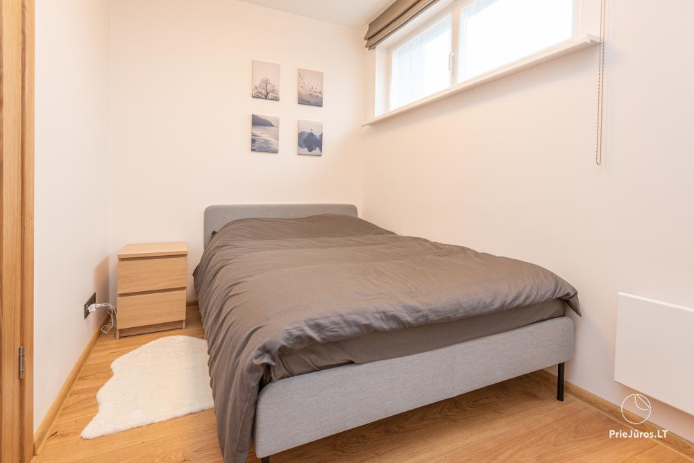 3-Zimmer-Ferienhaus in Pervalka mit Kamin und Sauna