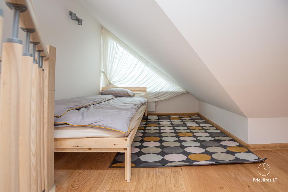 3-Zimmer-Ferienhaus in Pervalka mit Kamin und Sauna