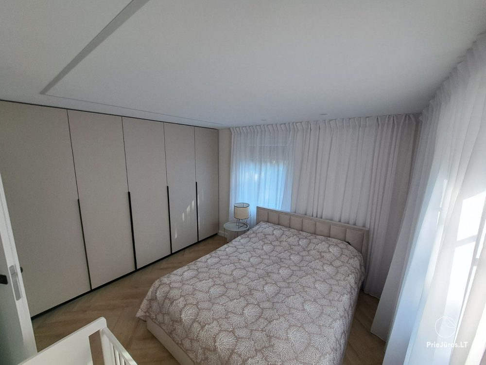 Stilvolle Wohnung mit privatem Garten und gemütlichem Haus mit Blick auf die Lagune zur Miete in Preila