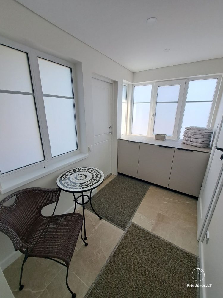 Stilvolle Wohnung mit privatem Garten und gemütlichem Haus mit Blick auf die Lagune zur Miete in Preila