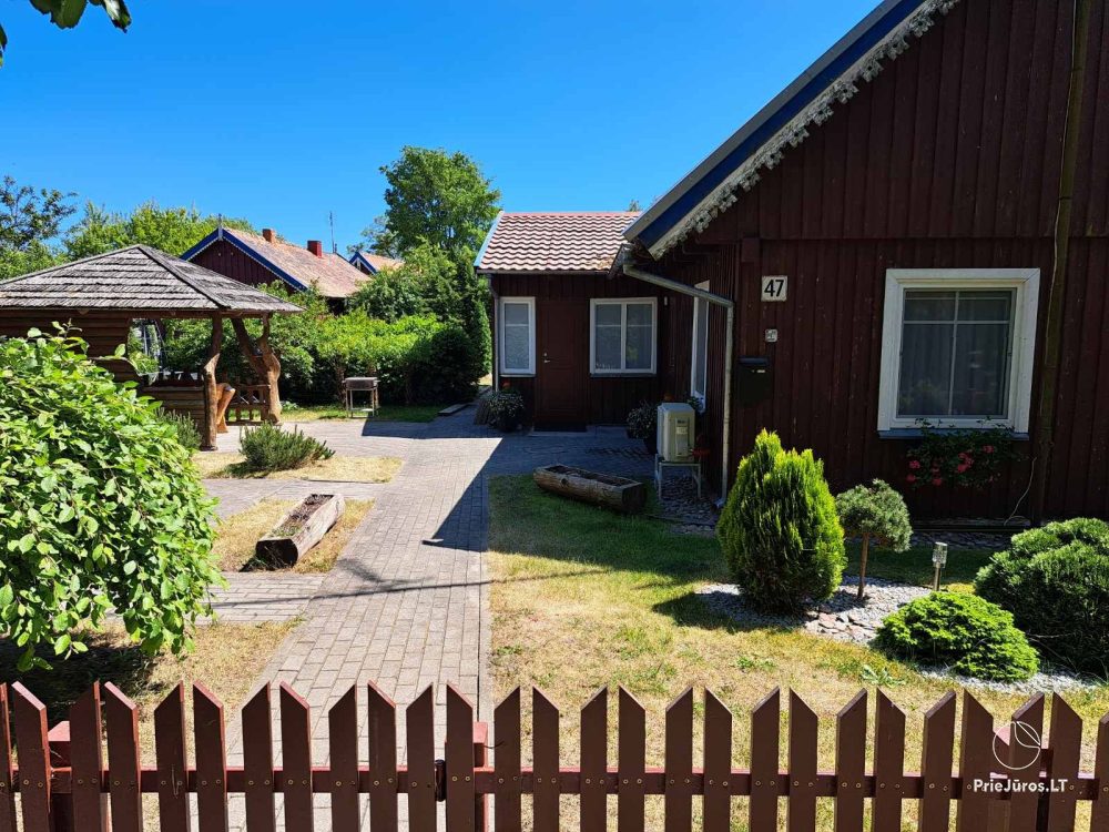 Stilvolle Wohnung mit privatem Garten und gemütlichem Haus mit Blick auf die Lagune zur Miete in Preila